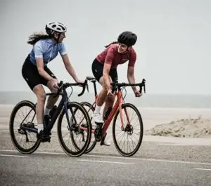 2 people riding bike
